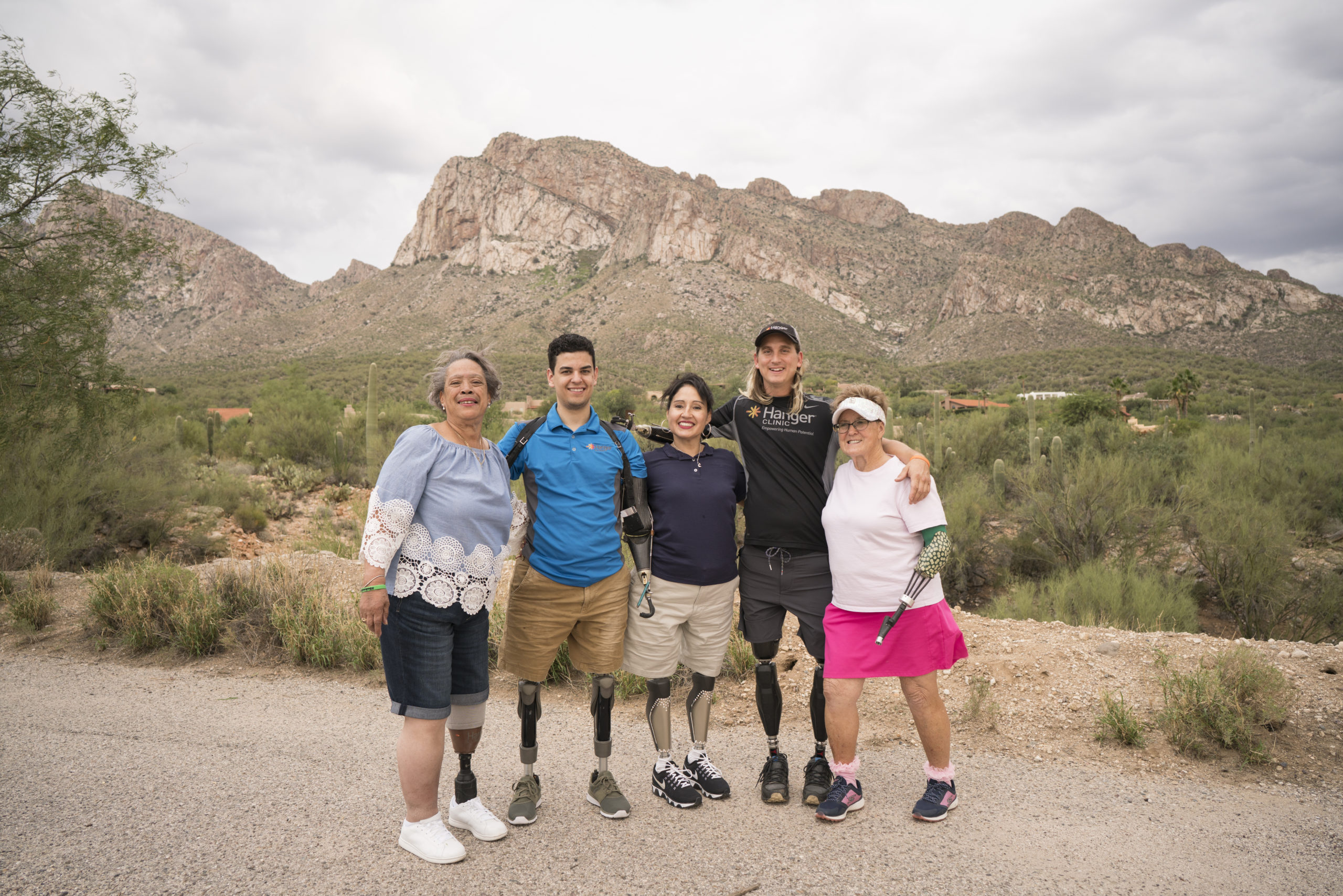 group shop of patients hiking in a desert setting